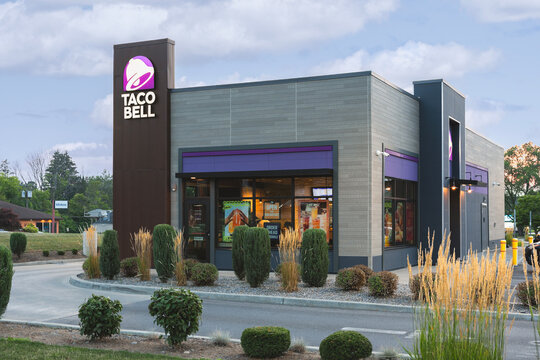 New Hartford, NY - Aug 8, 2025: Taco Bell, is an American-based chain of fast-food restaurants known for its Mexican-inspired cuisine. Founded in 1962 by Glen Bell with over 7,000 locations worldwide