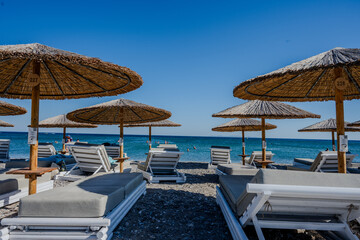 beach chairs and umbrellas
