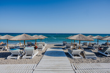 beach chairs and umbrellas on the beach