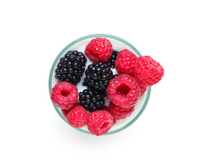 Glass of tasty yogurt with fresh raspberries and blackberries on white background