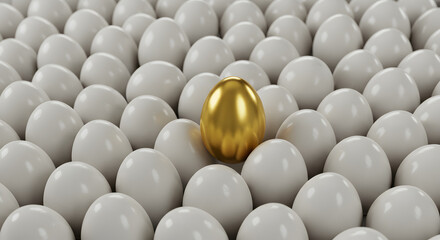 White and gold chicken eggs in vertical position on plain black paper background. Creative minimalist abstract Easter concept.