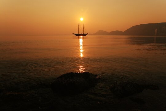 Gulet anchored in Alicante Bay, Spain, with an impressive sunset.