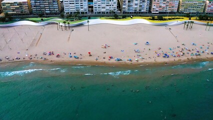 Aerial view of the numerous hotels of Poniente Beach in the Mediterranean city of Benidorm, Spain.