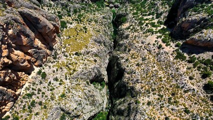 Aerial view of the narrow gorges and ravines created by the Amadorio River as it passes through the village of Relleu, Spain.