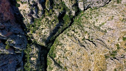 Aerial view of the narrow gorges and ravines created by the Amadorio River as it passes through the village of Relleu, Spain.