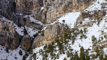 Aerial view of heavy snowfall over the mountains of the village of Castell de Castells in the province of Alicante, Spain.