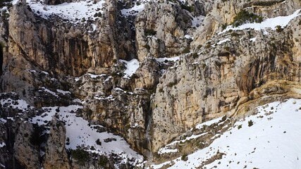 Aerial view of heavy snowfall over the mountains of the village of Castell de Castells in the province of Alicante, Spain.