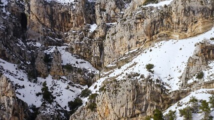 Aerial view of heavy snowfall over the mountains of the village of Castell de Castells in the province of Alicante, Spain.