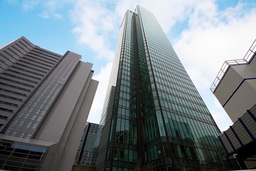 Modern skyscrapers and other business buildings with their glass facades in the La Defense district of Paris, France.