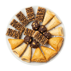Assortment of sweet pastries and desserts arranged on a round white plate delicious treats