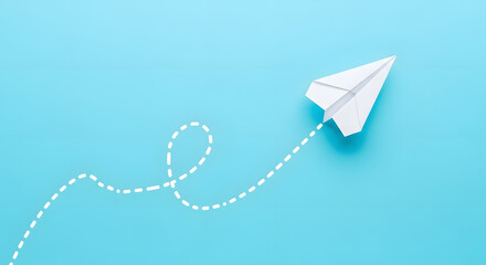 Red paper plane on blue background