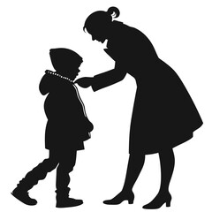 Mother buttoning child’s coat silhouette