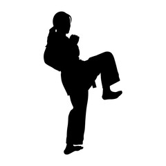 Silhouette of a Woman Karate Athlete.