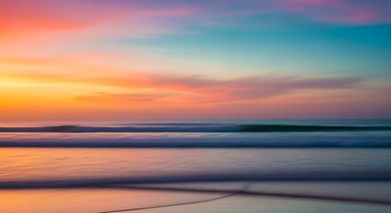 Fototapeta premium Vibrant sunset over the ocean with colorful sky reflecting on the water and gentle waves.