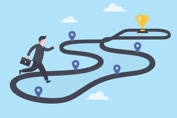 Businessman running on a winding path towards a golden trophy representing success and achievement