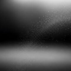 A grayscale abstract design displays a swirling, diffused light effect, with fine particles dispersing across a gradient background.