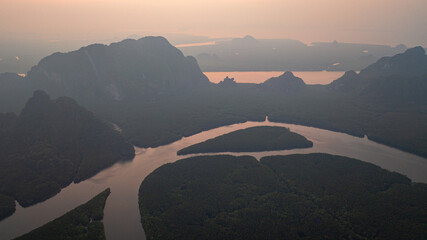 Aerial drone view of heart shape Island of Love in mangrove forest 
beautiful green mangrove forest sea water. Heart shaped Island.view over heart island.archipelago and mangrove forest background