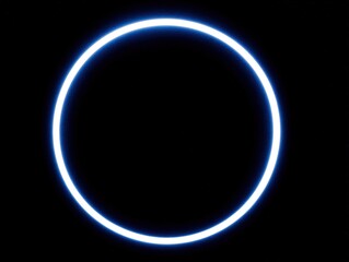 Obraz premium Glowing Blue Circle on Dark Background, Minimalist Technology Element, User Interface Component, Abstract Digital Design Asset