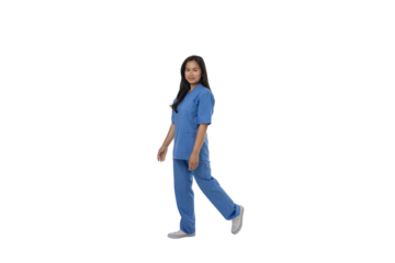 Doctor in blue scrubs walks confidently, isolated on white, PNG