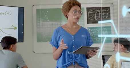 Teacher gesturing toward student while referencing tablet, AR overlay showing geometry flows - Powered by Adobe