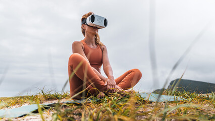 Woman exploring virtual reality meditation outdoors, seacoast. Fusion of nature, digital innovation, and mindfulness. Concept of immersive experience, calm lifestyle, and VR future wellness.