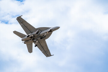 Air show planes flying in formation in blue sky