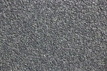 朝日にきらめくアスファルトの表面、輝く