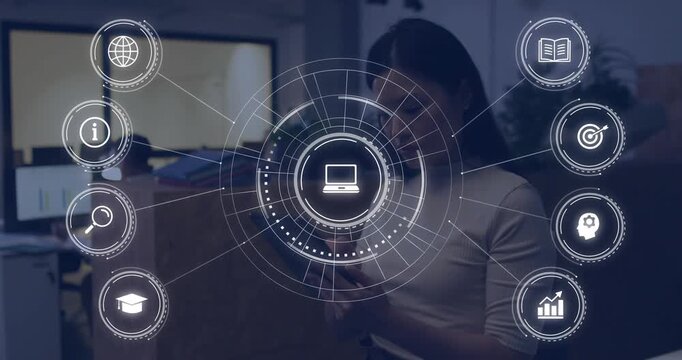Colleague tapping tablet and revealing holographic interface with rotating data icons for analysis