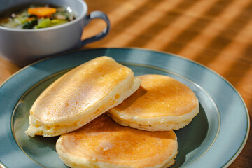Homemade pancakes with soup for breakfast
