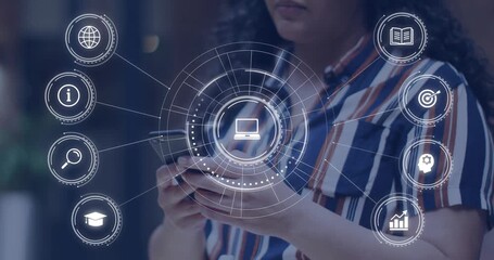 Mid-adult woman tapping smartphone icons and swiping phone animating holographic tech UI in office - Powered by Adobe