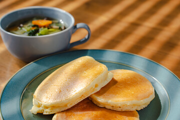 Homemade pancakes with soup for breakfast
