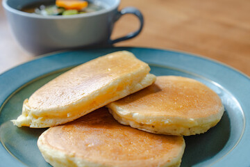 Homemade pancakes with soup for breakfast
