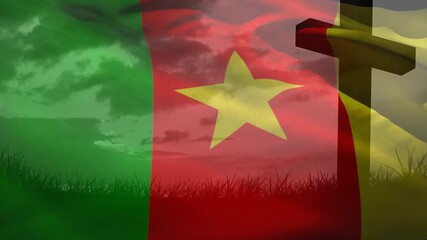 Gentle breeze starting Cameroon flag rippling across hill revealing sky behind cross silhouette - Powered by Adobe