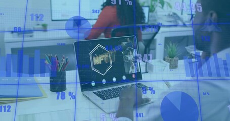 Mid-adult man clicking trackpad using technology and animating NFT metrics charts rising above 2000 - Powered by Adobe