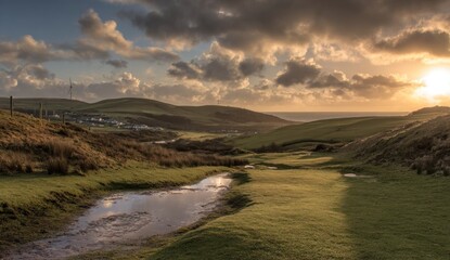 A serene landscape at sunrise, showcasing rolling hills, green pastures, and a tranquil valley.