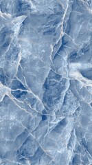 Seamless texture of blue marble with white veining, featuring angular indentations and protrusions,