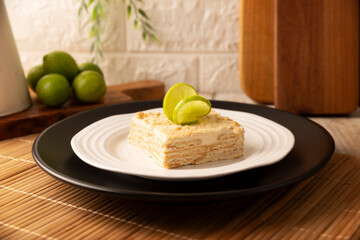 Carlota de Limon, a cold, no-bake dessert made with layers of Maria cookies and a creamy mixture of lemon and condensed milk, an easy homemade recipe very popular in Mexico.