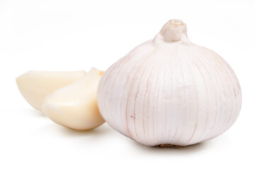 front view fresh peeled garlic cloves, bulb with garlic slices isolated