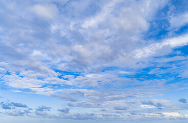 Fototapeta premium Morning sky with cloud. Sky and cloud formation. Weather cloudscape. Sky filled with cloud reflection. Overcast scene. Cloudy sky view. Cloud drifting. Cloudy atmospheric backdrop