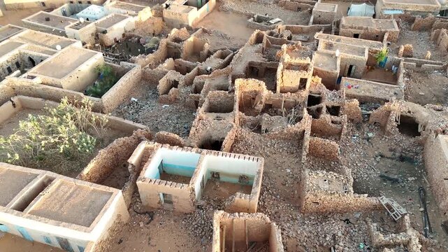 aerial top down view of traditional stone house in Chinguetti old town in Mauritania, UNESCO World Heritage North Africa