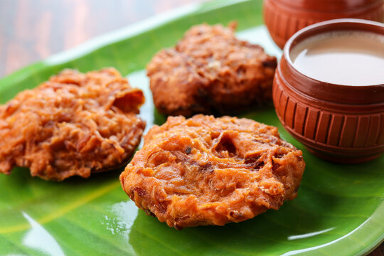 Ulli vada spicy onion fritters popular South Indian deep fried tea time snack with onion Kerala India . Indian . Traditional Indian food for Ramadan Ramzan. Kerala snack.