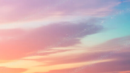 Obraz premium A Pastel Sky Dreamscape With Clouds Shifting Between Pink, Purple, Orange and Blue As the Sun Sets on the Horizon