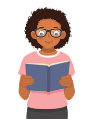 African woman reading book novel holding on her hands
