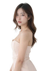 Obraz premium Elegant Asian woman in a strapless dress with natural makeup and long hair, photographed against a clean isolated