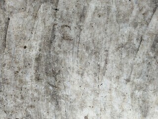 Grunge concrete wall texture with rough white and gray patterns, ideal for industrial design and backgrounds.