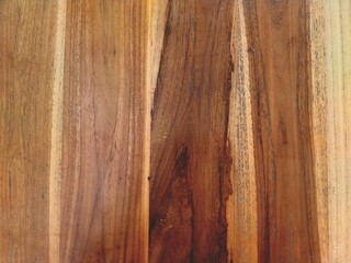 Wooden plank texture with natural grain patterns, perfect for background, design, and rustic decoration.