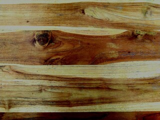 Wooden plank texture with natural grain patterns, perfect for background, design, and rustic decoration.