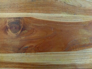Wooden plank texture with natural grain patterns, perfect for background, design, and rustic decoration.