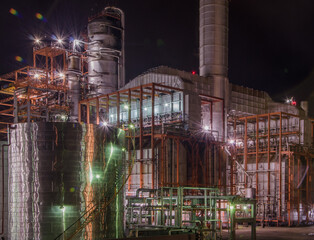 Oil refinerie, industrial facilities that process crude oil into a wide range of usable petroleum...