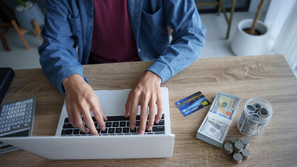 Business man saving money accountant financial analyst and auditor working and laptop for calculating